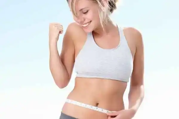 Unraveling the Mystery: Where Does the Body Fat Loss From First? 3 Image of woman happy with fat loss Northamptonshire